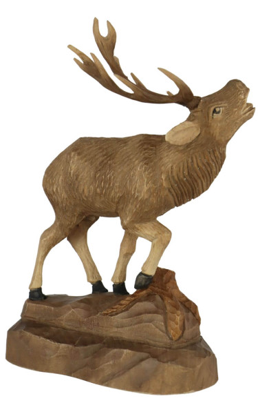 Stag with raised leg, carved, 17 cm by Schnitzkunst aus dem Erzgebirge